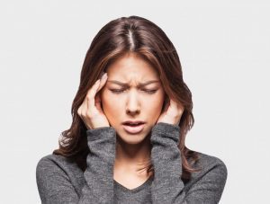 A Woman With Migraine 300x227
